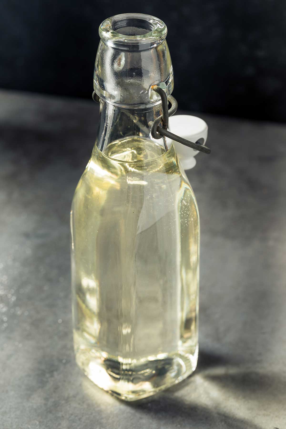 large glass bottle of homemade simple syrup