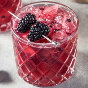 closeup of a glass of skinny blackberry margarita