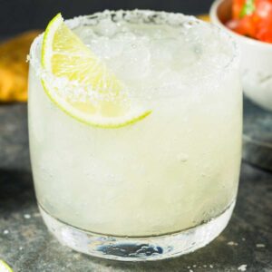sugar free margarita with salted rim and lime wedge