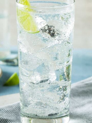 Tequila Ranch Water cocktail with lime wedge.