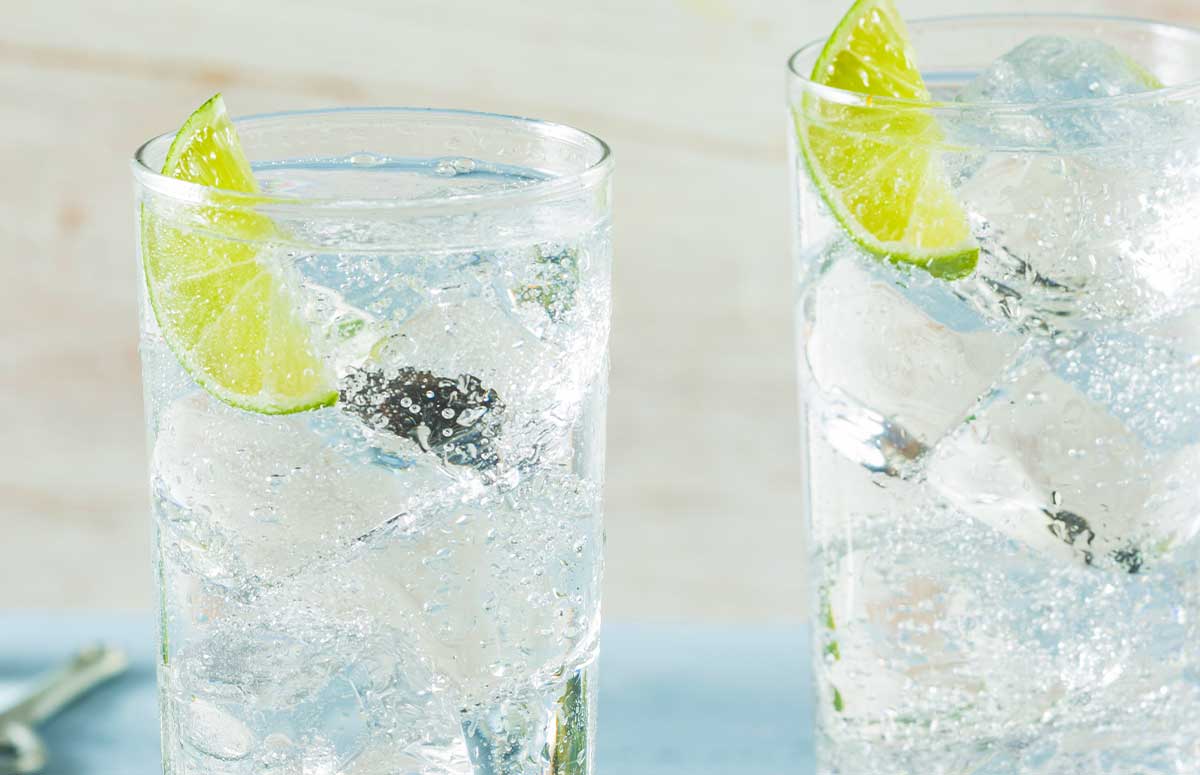 Tequila Ranch Water cocktail with lime wedge.