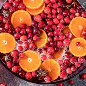 tequila Christmas punch with oranges and cranberries