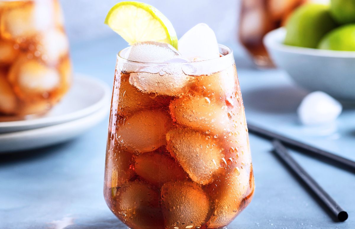 Dr. Pepper Margarita with a lime wedge