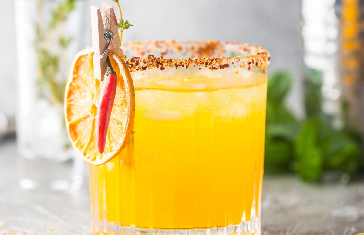 orange margarita with tajin rim
